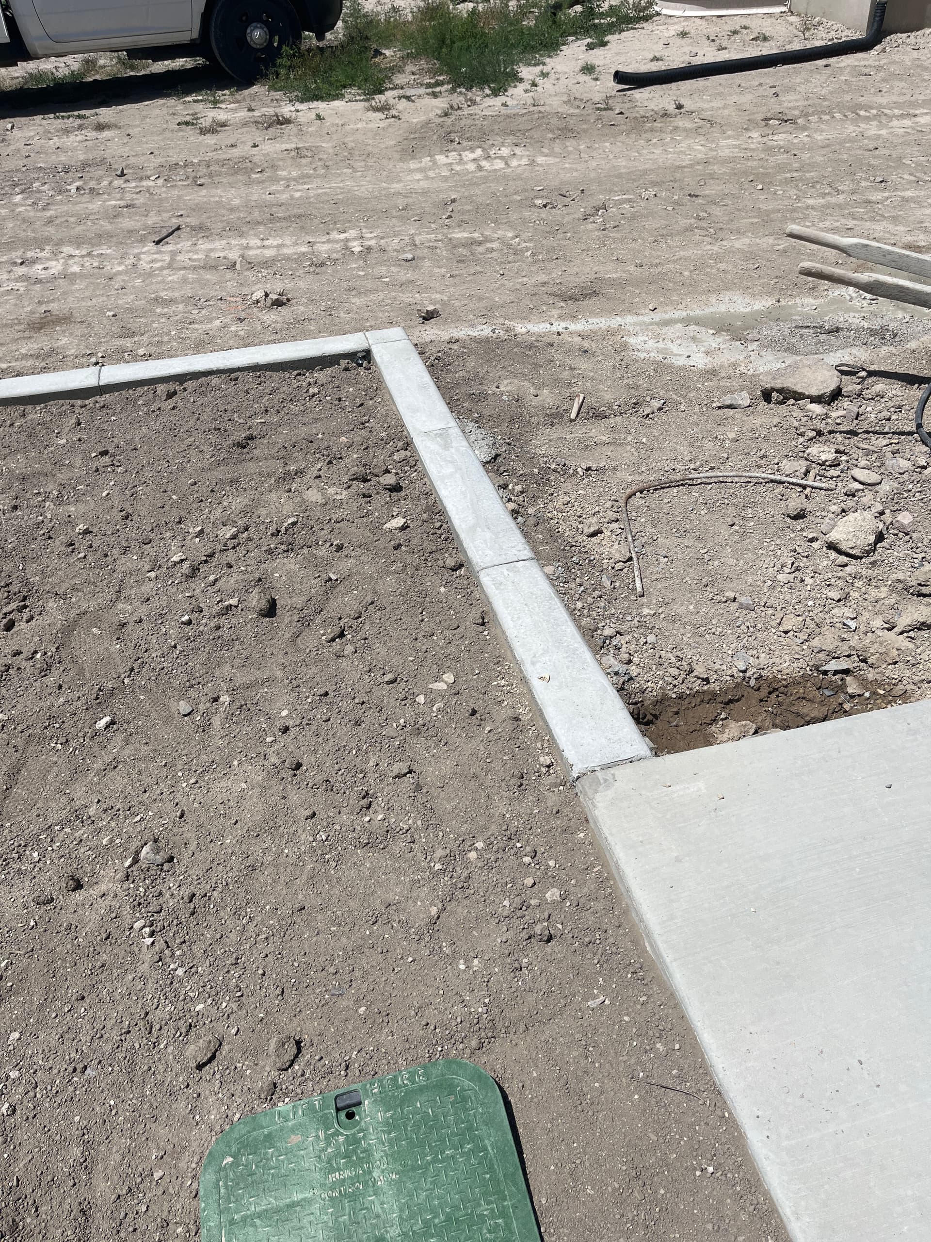 Gallery photos for Concrete Curbing Ties Pool Decking Into Stone Retaining Wall: Image #3