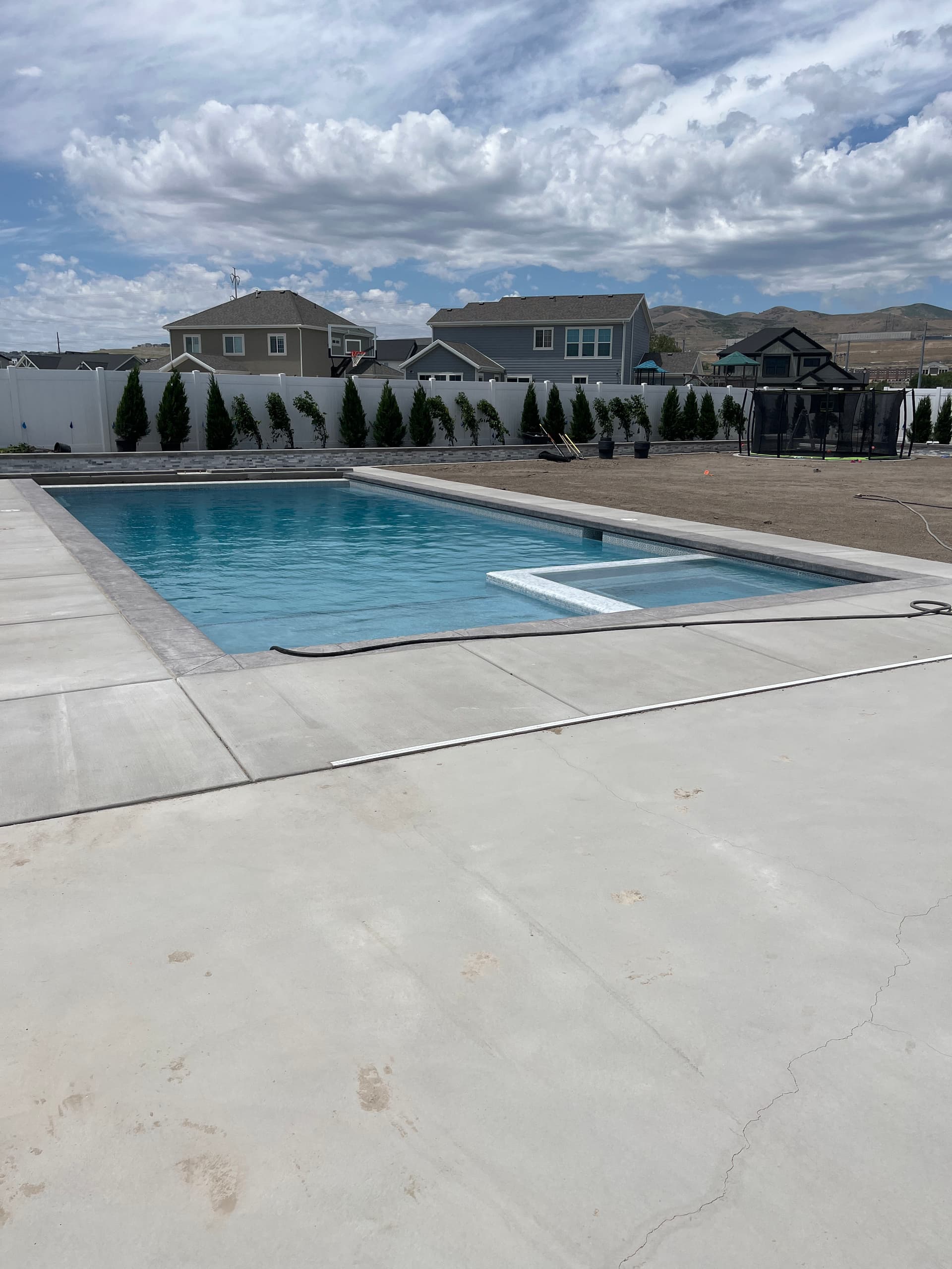 Custom Backyard Pool and Spa Build in the Final Stretch image