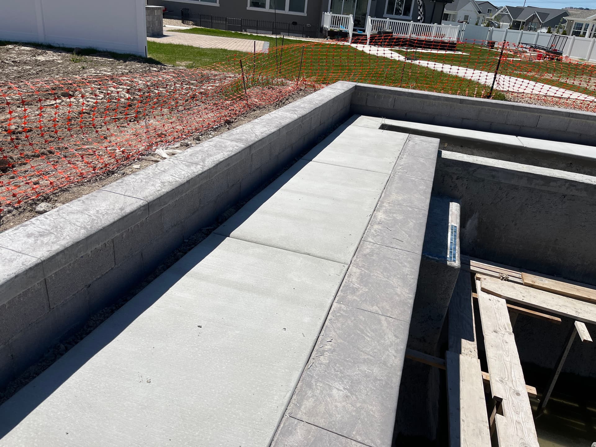 Gallery photos for Pool Build in Progress with Concrete Deck, Coping, and Tile Work Underway: Image #2