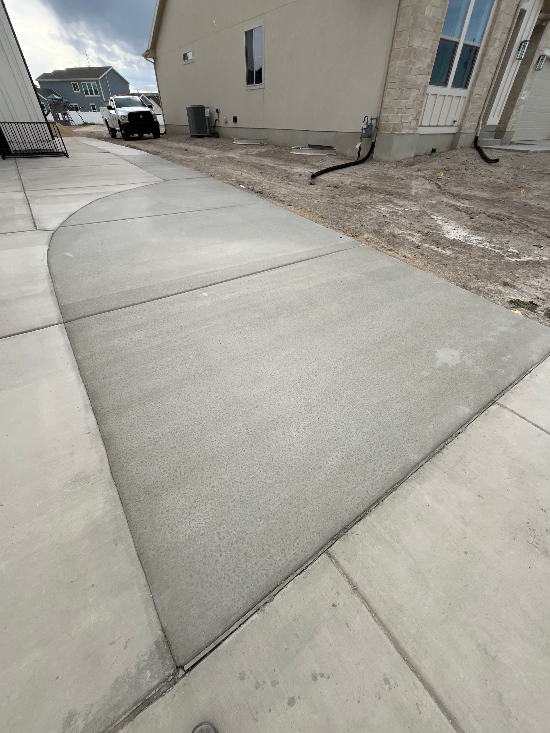 Concrete Walkways and Driveway Extension at Custom Pools image